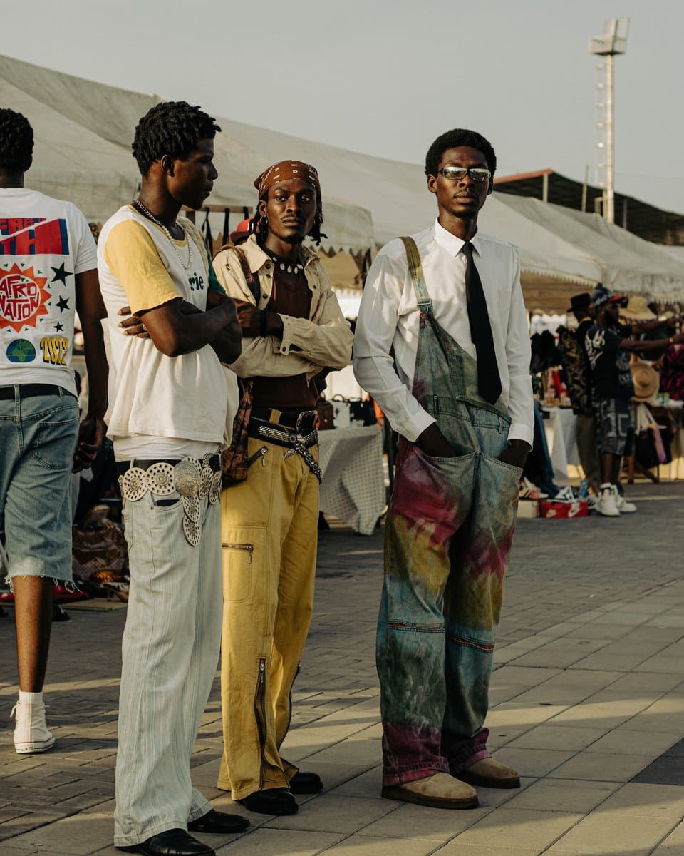 Two friends outside the entrance to Vintage Gala